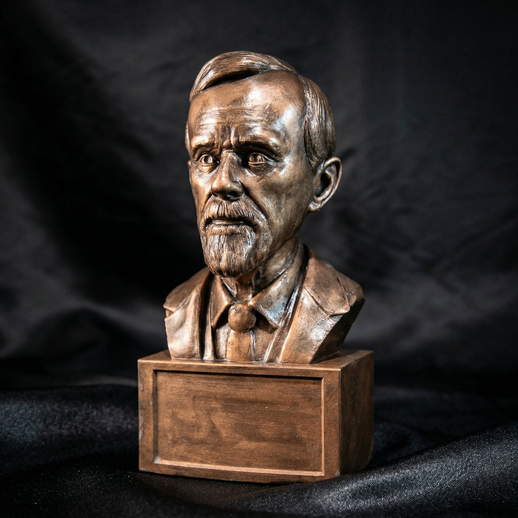 A founder's likeness, presented as honor.